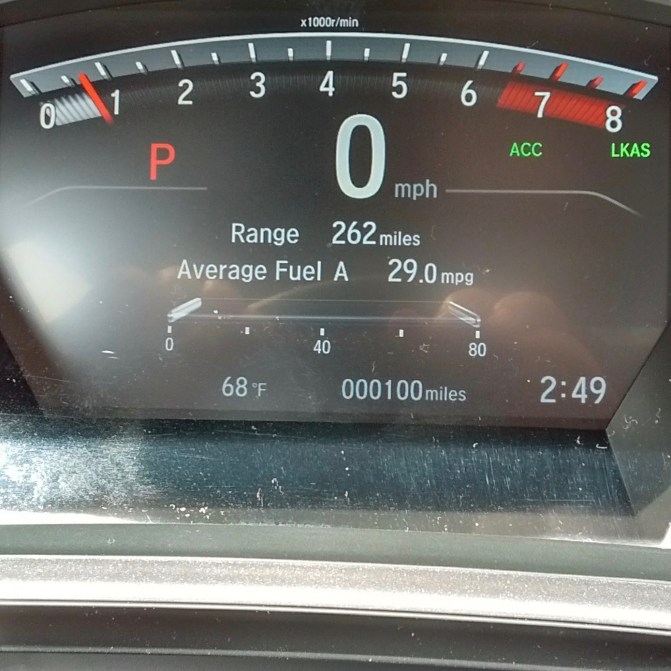 Car odometer reading 000100 miles.