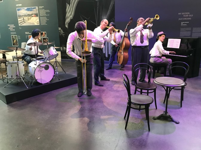 Statues of six jazz musicians, playing different instruments.