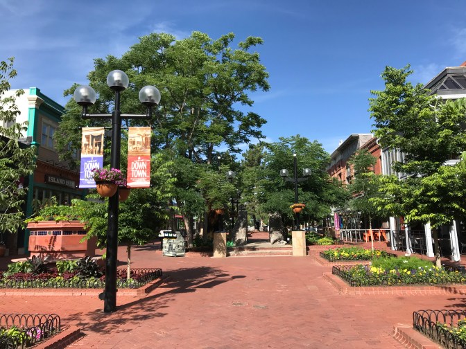 Tree-lined Pearl Street in Boulder, Colorado.