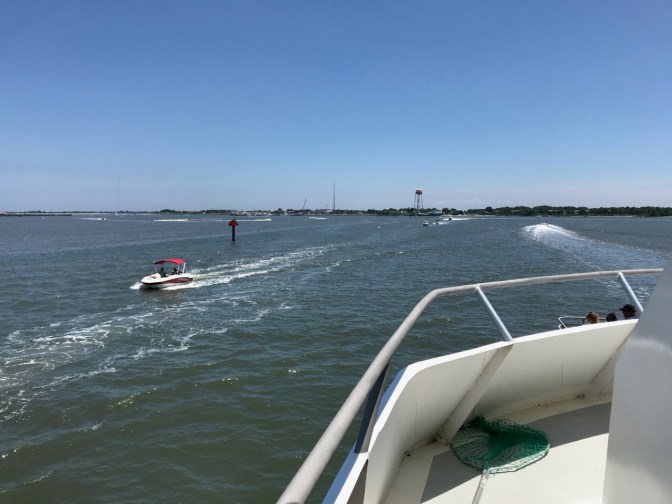 Cape May Harbor, with numerous vessels on the surface.