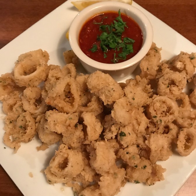 Fried calamari with marinara sauce.