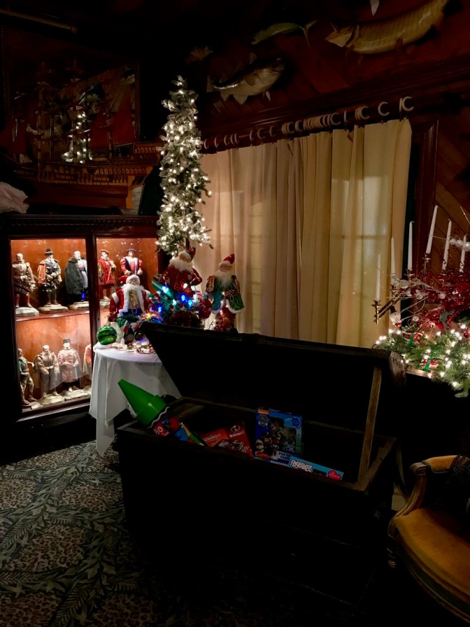 Christmas decorations including tree and Santa Claus.