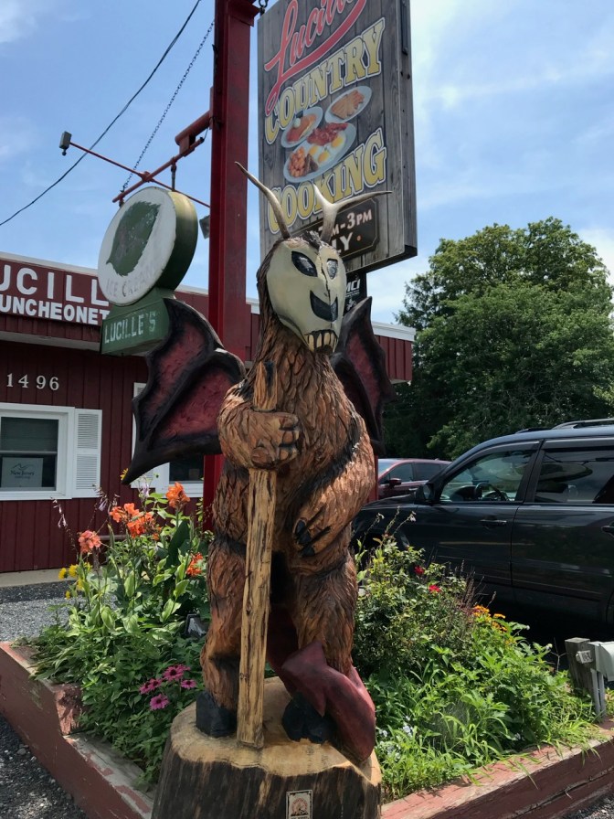 Jersey Devil statue carved from wood outside the restaurant.