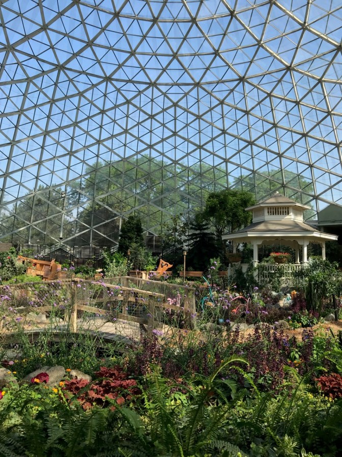 Interior of dome, with flowers, a bridge, and a pagoda visible.