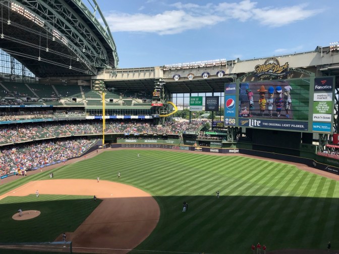 Field of Miller Park with Sausage Race displayed on screen.