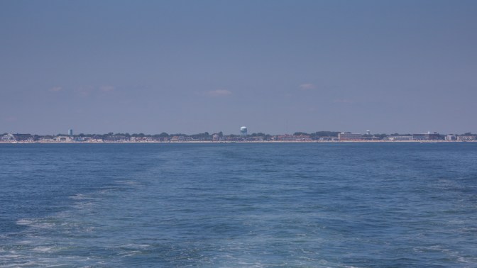 Looking toward coast of Cape May, with water of ocean in foreground.