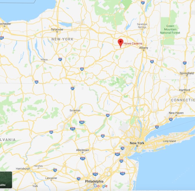 Map of New York State with a red pin in the location of Howe Caverns