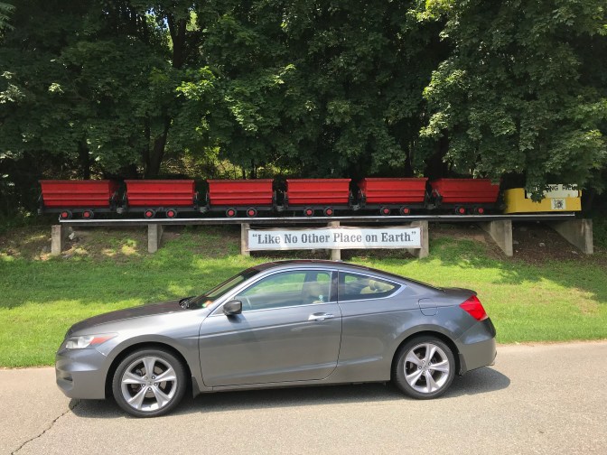 2012 Honda Accord coupe parked in front of mining