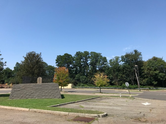 Gravesite in parking lot.