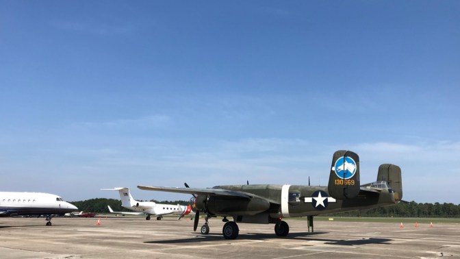 B-25 Mitchell bomber parked on tarmac.