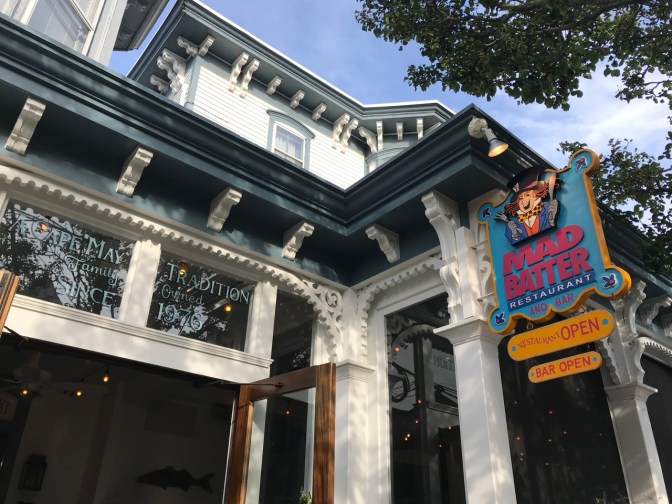 Exterior of Mad Batter restaurant with sign that says MAD BATTER RESTAURANT AND BAR RESTAURANT OPEN BAR OPEN