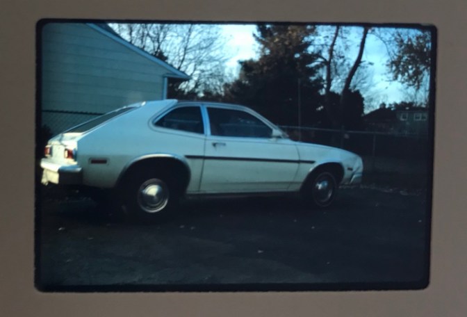 Slide photo of white Ford Pinto.