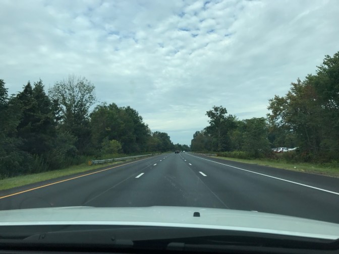 View of I-287 with clouds in distance.