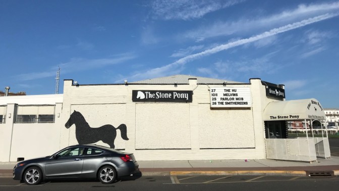 Gray Honda Accord coupe in front of The Stone Pony in Asbury Park.