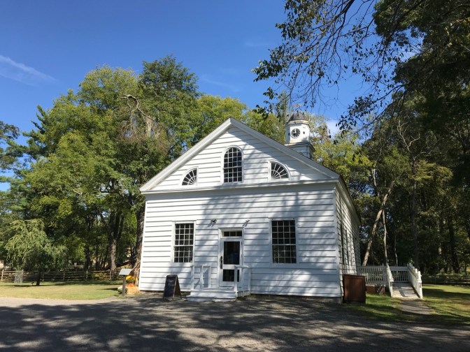 Chapel of Allaire Village, clad in white siding.