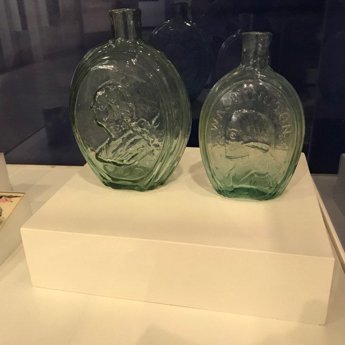 Two glass bottles of George Washington.