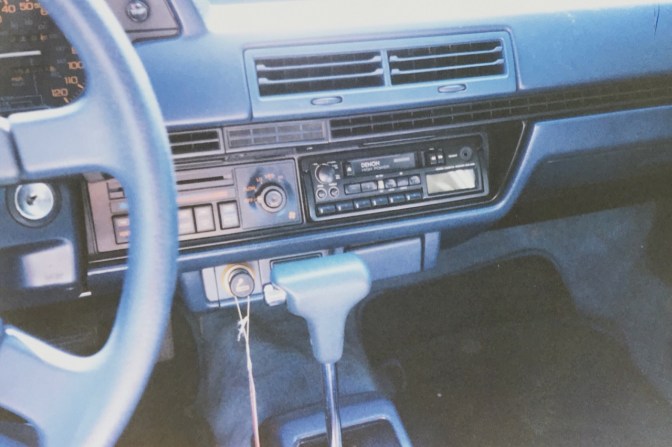 Dashboard of Honda Accord (blue, with black accents).
