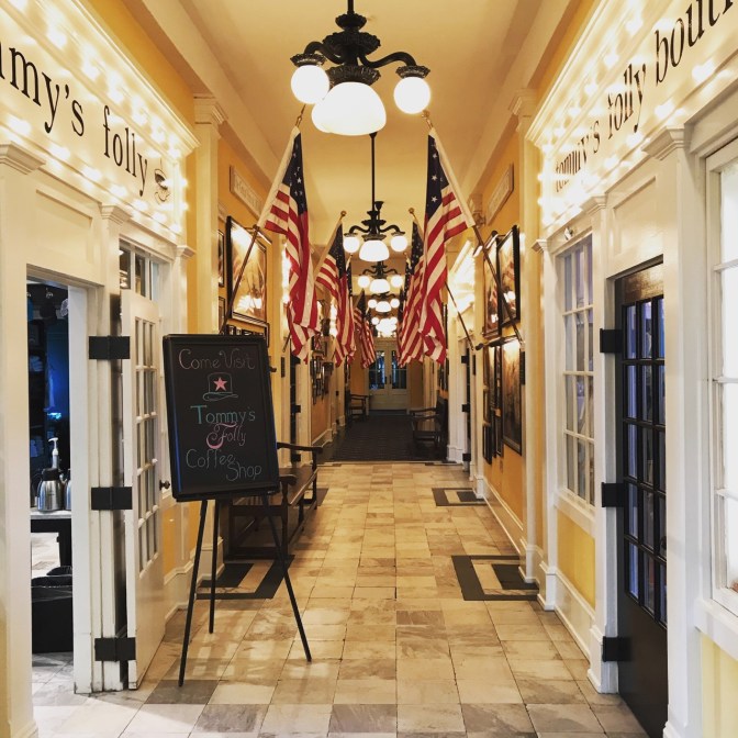 Interior hallway of Congress Hall, with flags lining the hallway