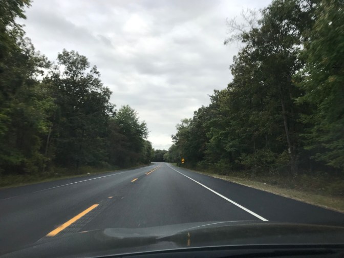 View of tree-lined Route 347, clear of any traffic.