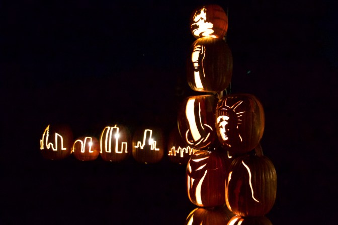 Statue of Liberty with New York Skyline, all carved from pumpkins.