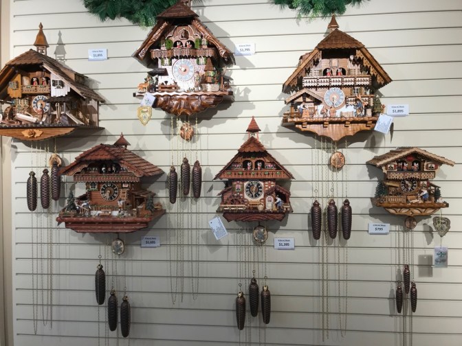 Selection of cuckoo clocks on a wall. 
