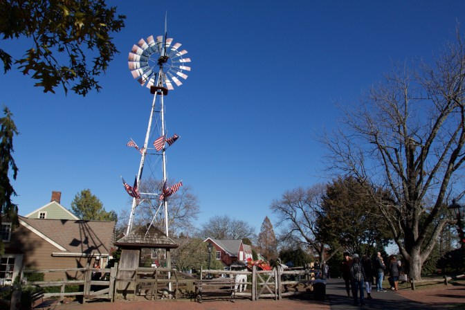 Windmill over village green.