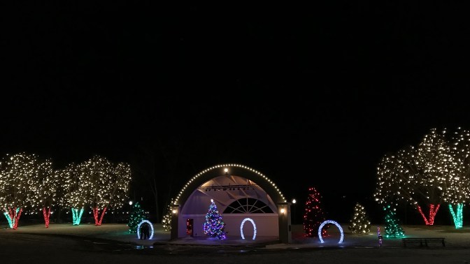 View of decorated hatch-shell and trees in Lakeside Park.