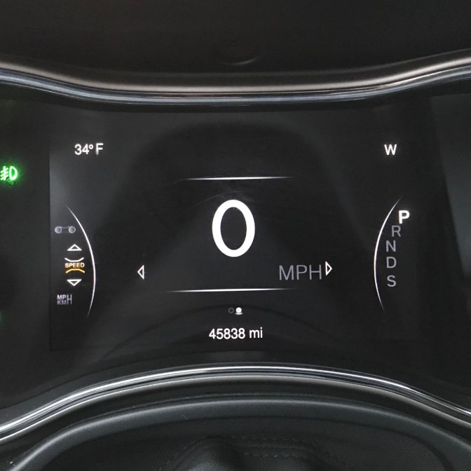 Car odometer reading 45838 miles.