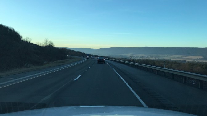 Sunset sky with rolling hills of Pennsylvania in the background.