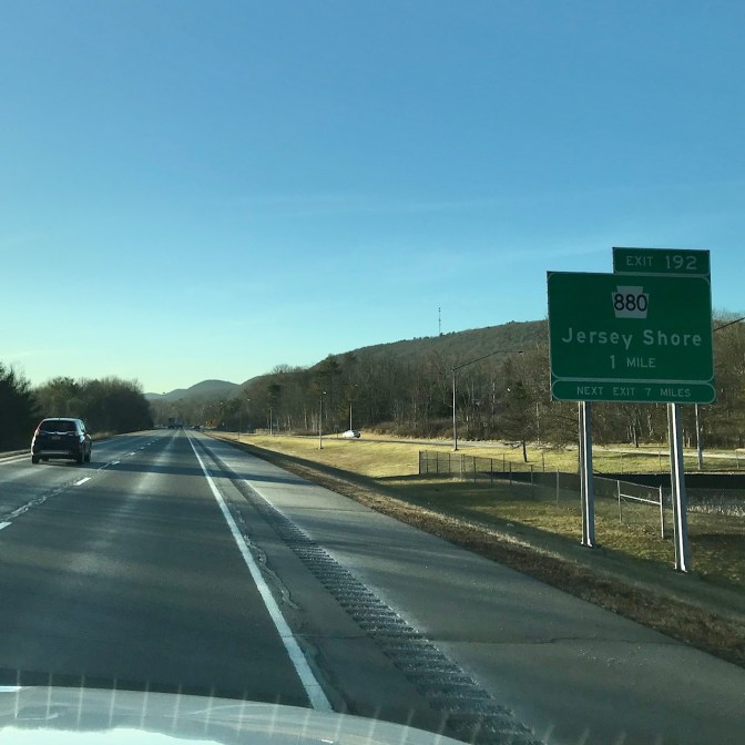 Road sign beside route 80 that says EXIT 192 880 Jersey Shore.