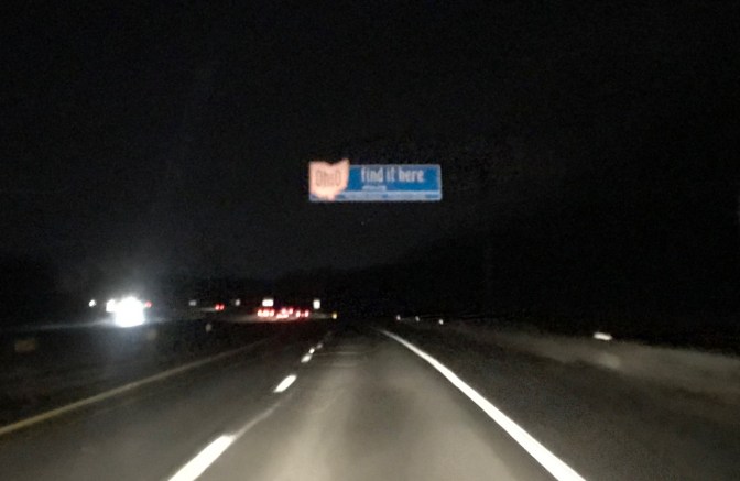 Road sign for Ohio across I-80 highway.