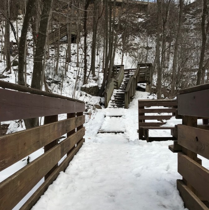 Ice-covered wooden stairs along side of Cascade Falls.