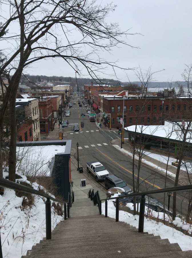View down stone steps, with downtown Stillwater visible in background.