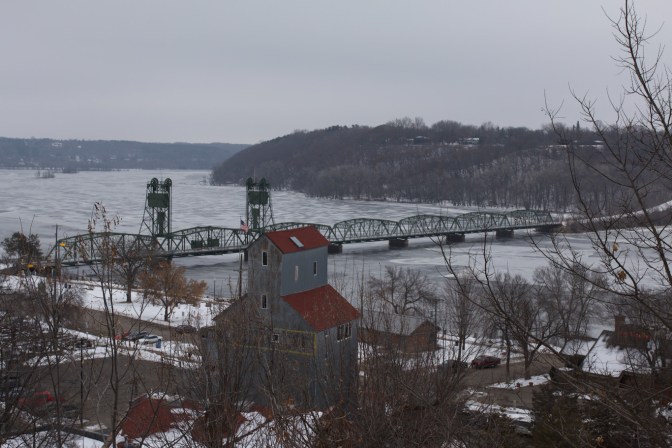 View of St. Croix RIver from top of hill, with Stillwater Lift Bridge on river.
