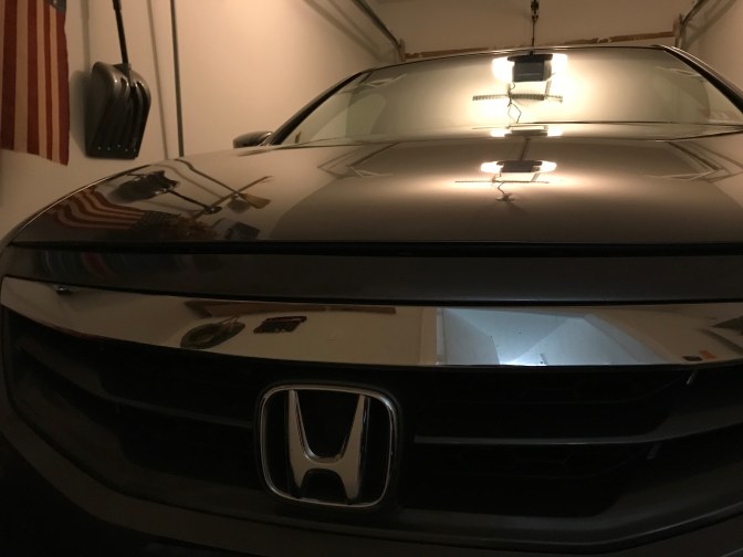 2012 Honda Accord parked in garage.
