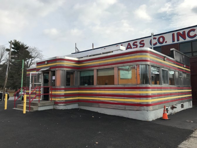 Exterior of Jack's Diner, with chrome, yellow, and red striping.