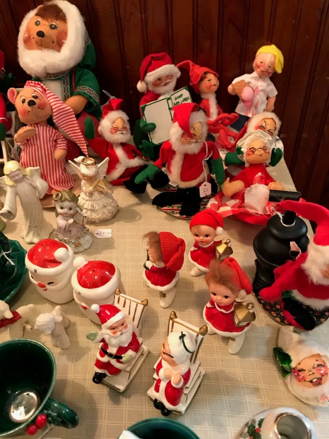 Tabletop filled with Anna Lee dolls.