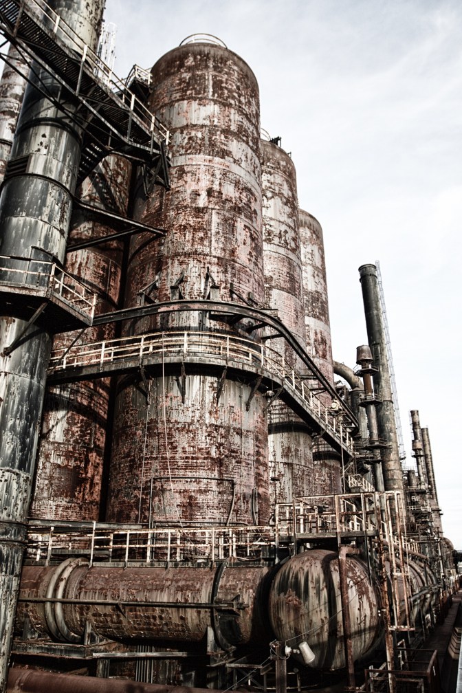 Photo of rusting steel stacks section.