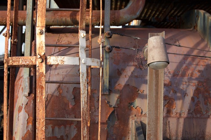 Close-up photo of metalwork of steel mill.