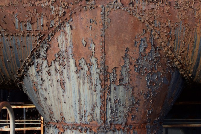 Rusting pipes of steel mil.