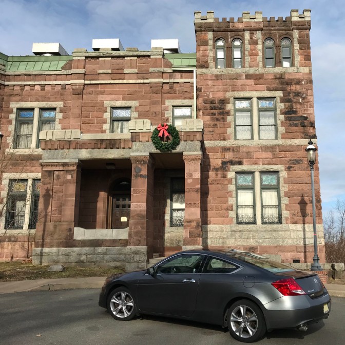 2012 Honda Accord parked in front of Lambert Castle.