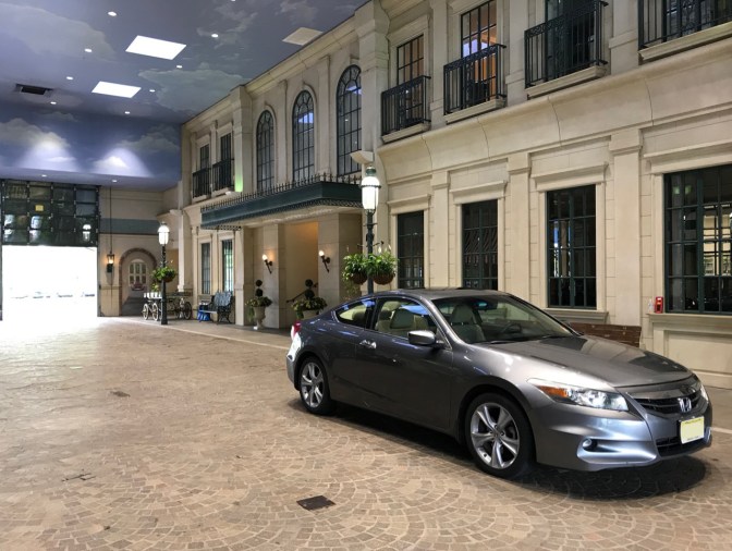 2012 Honda Accord parked in dealer's maintenance driveway - driveway is made to look like street in Europe.