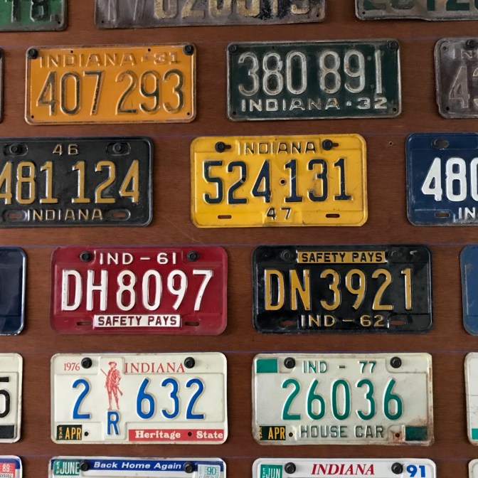 Wall covered in Indiana license plates.