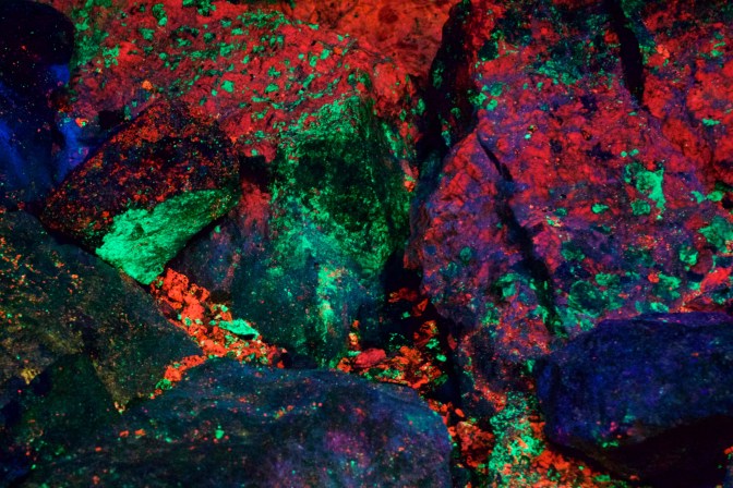 Fluorescent rocks, filled with greens, blues, and reds.