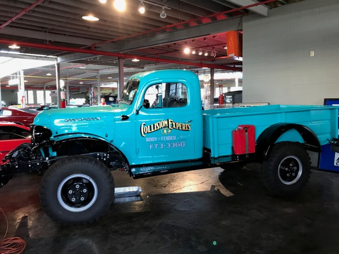 Blue Dodge Power Wagon pickup truck.
