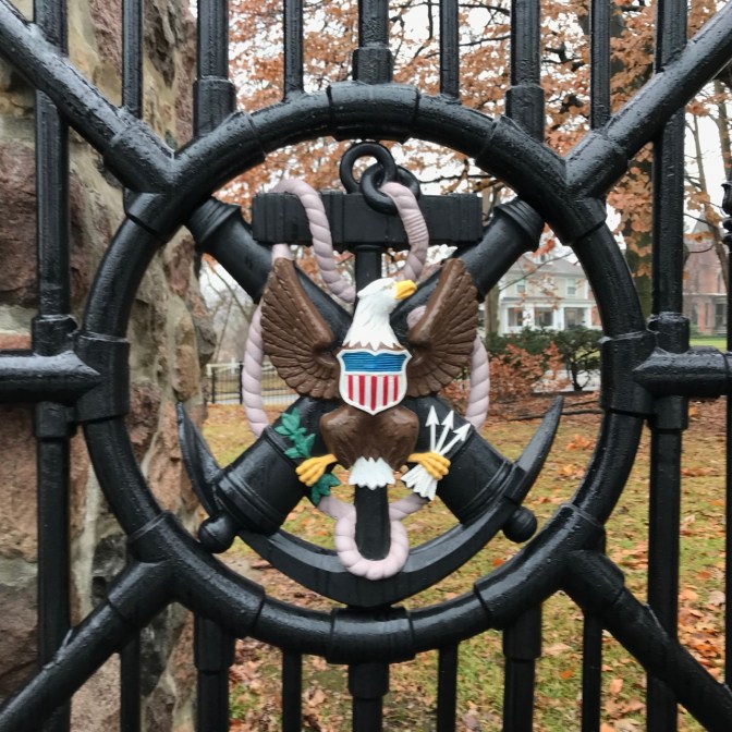 American bald eagle engraved on metal grates, with Presidential seal.