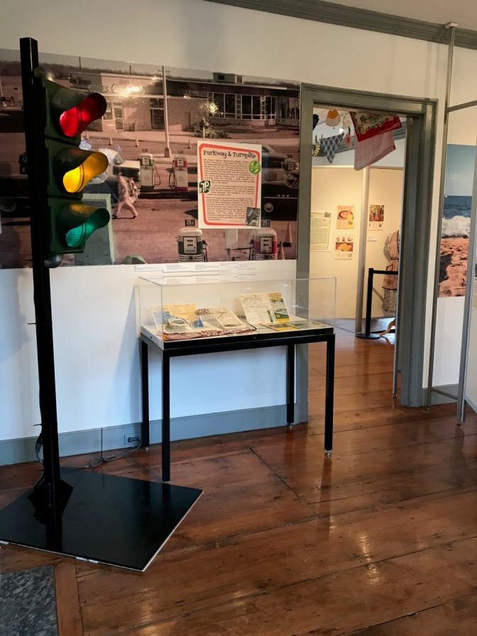 Room filled with exhibit on NJ Turnpike and Garden State Parkway. a traffic light stands in the corner.