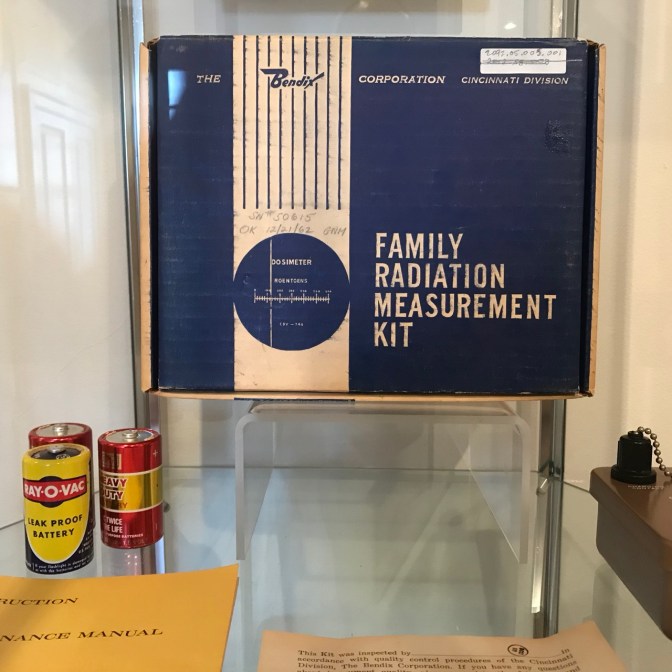 Display case with box of FAMILY RADIATION MEASUREMENT KIT