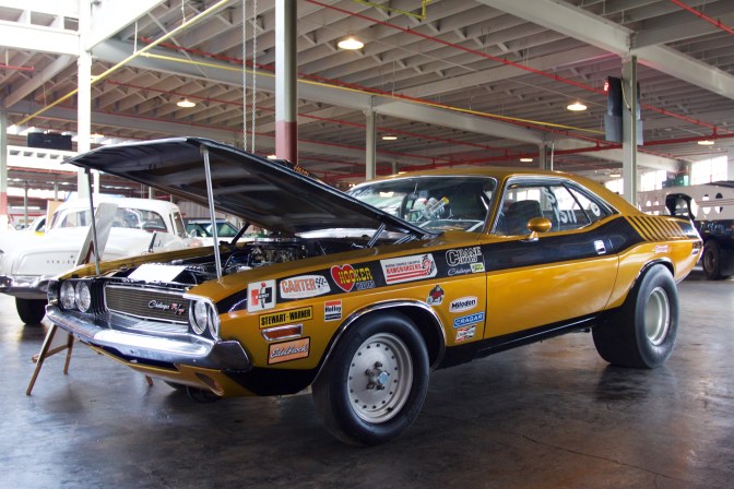 Lime-green Dodge Challenger race car.
