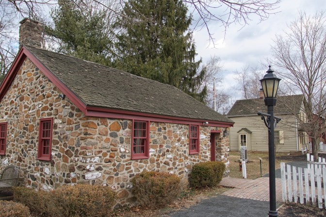 Stone one-room schoolhouse.